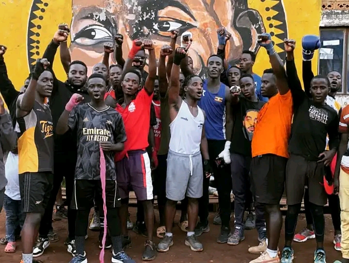 A group of Nigerian boxers training in a gym, showcasing their dedication