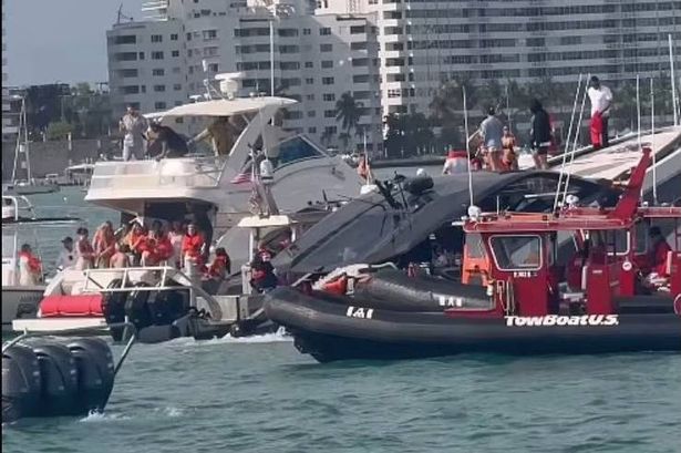 Multiple rescue boats surrounding the sinking Lamborghini yacht near Miami Beach