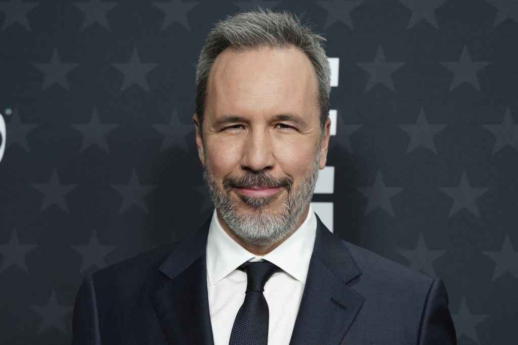 Denis Villeneuve, acclaimed director, photographed at a film festival.