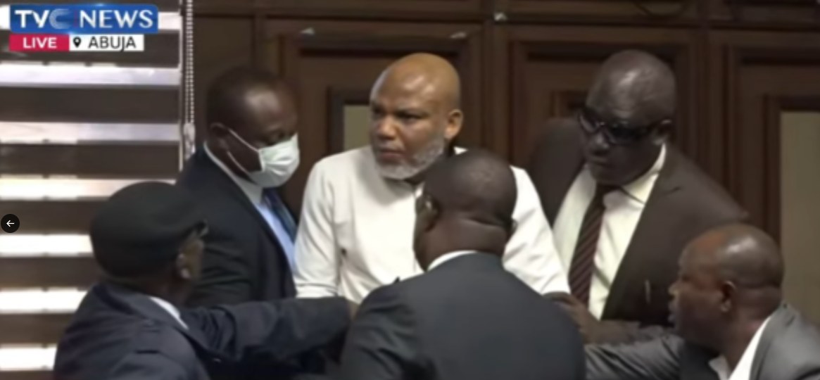 Nnamdi Kanu in court during a previous trial session surrounded by security operatives